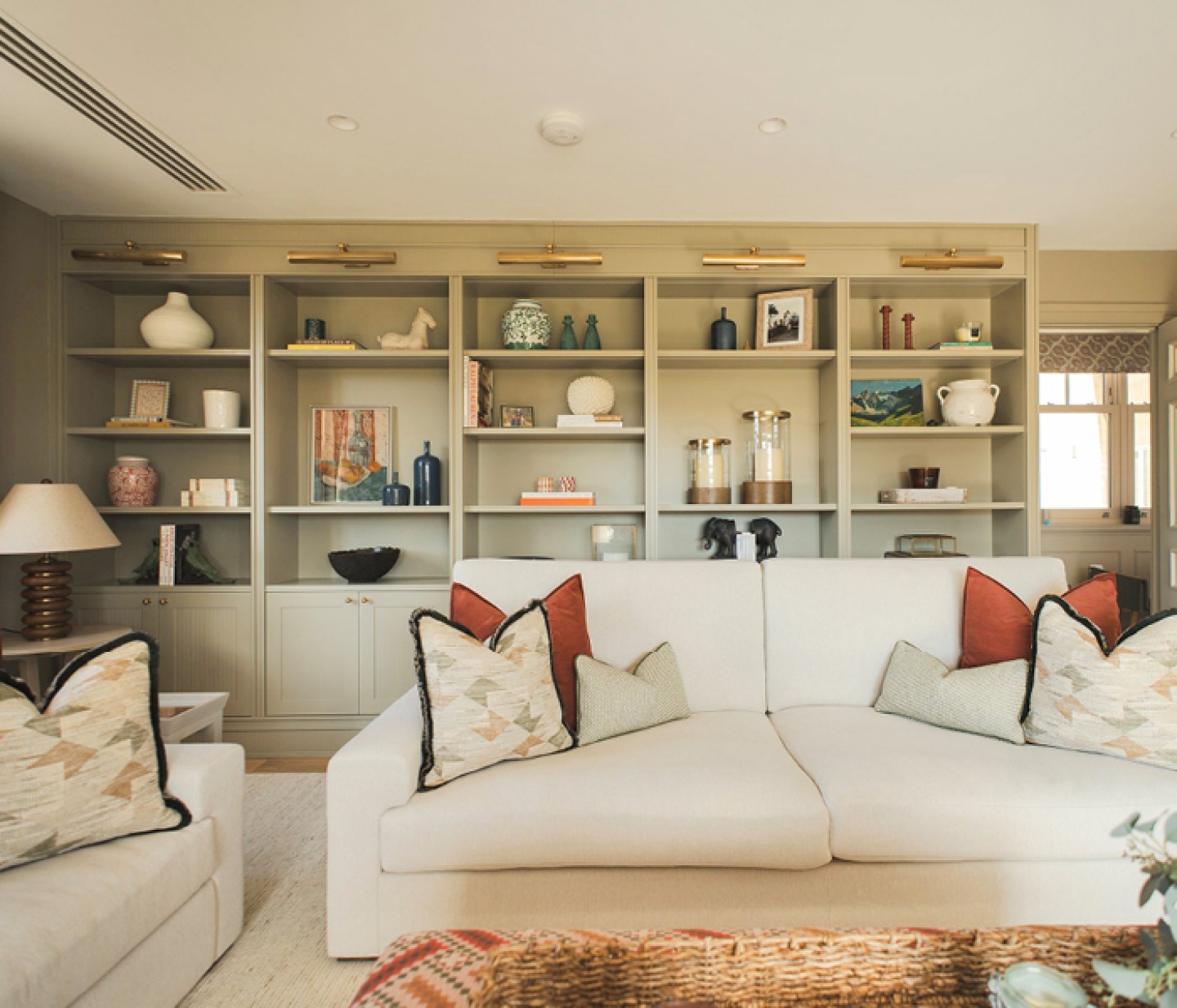 Modern lounge with bespoke built in shelving