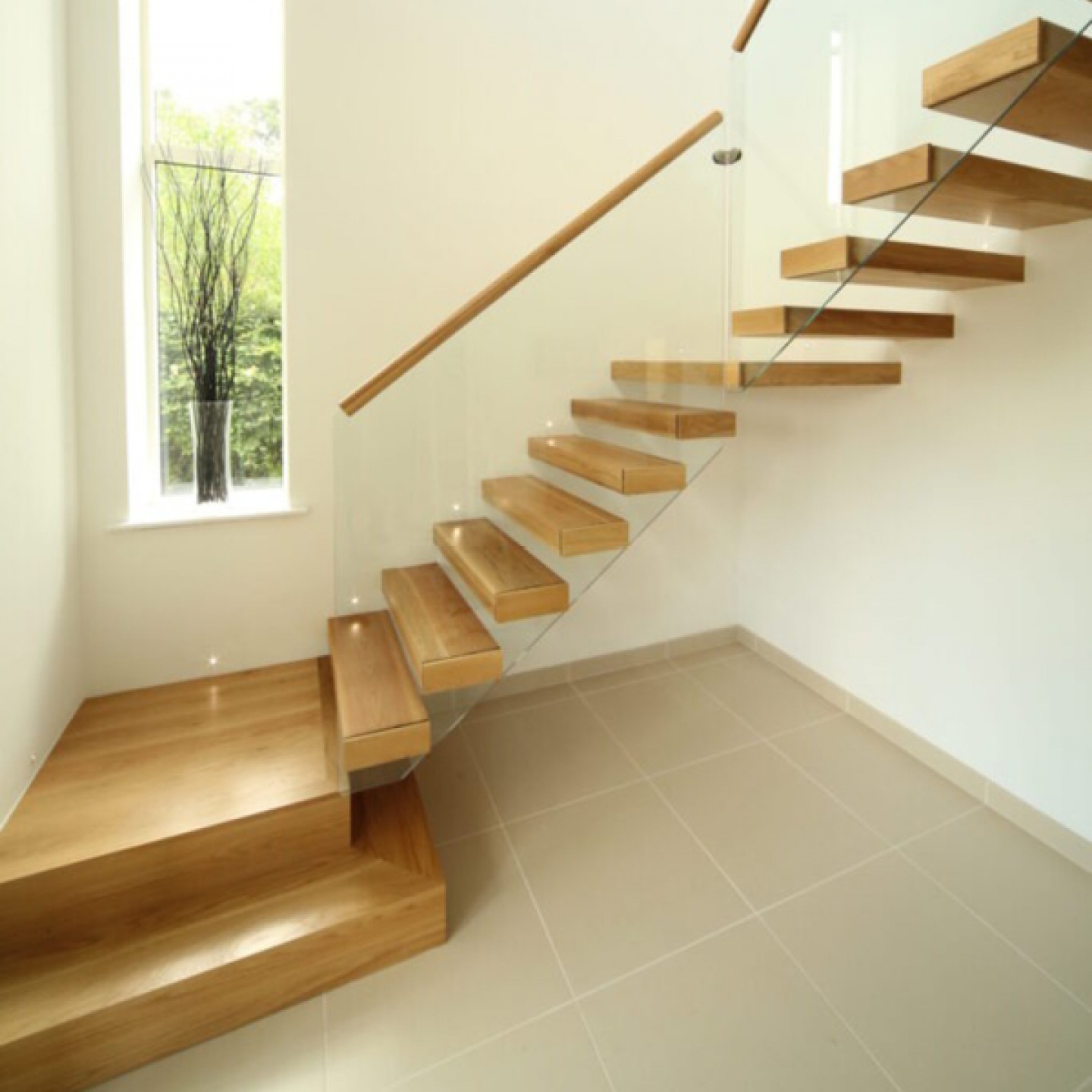 Glass and wooden staircase