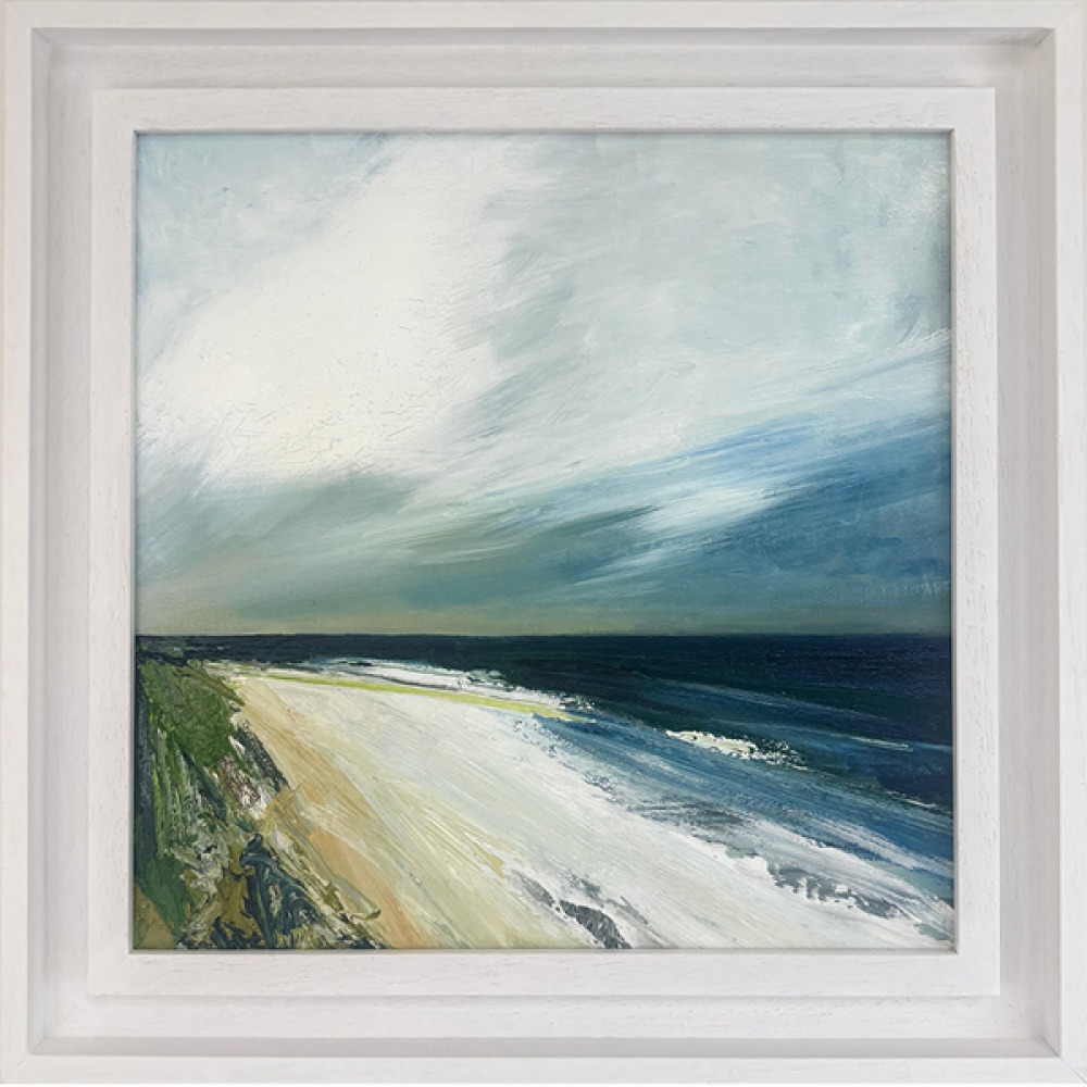 beach and sea painting in white wooden frame