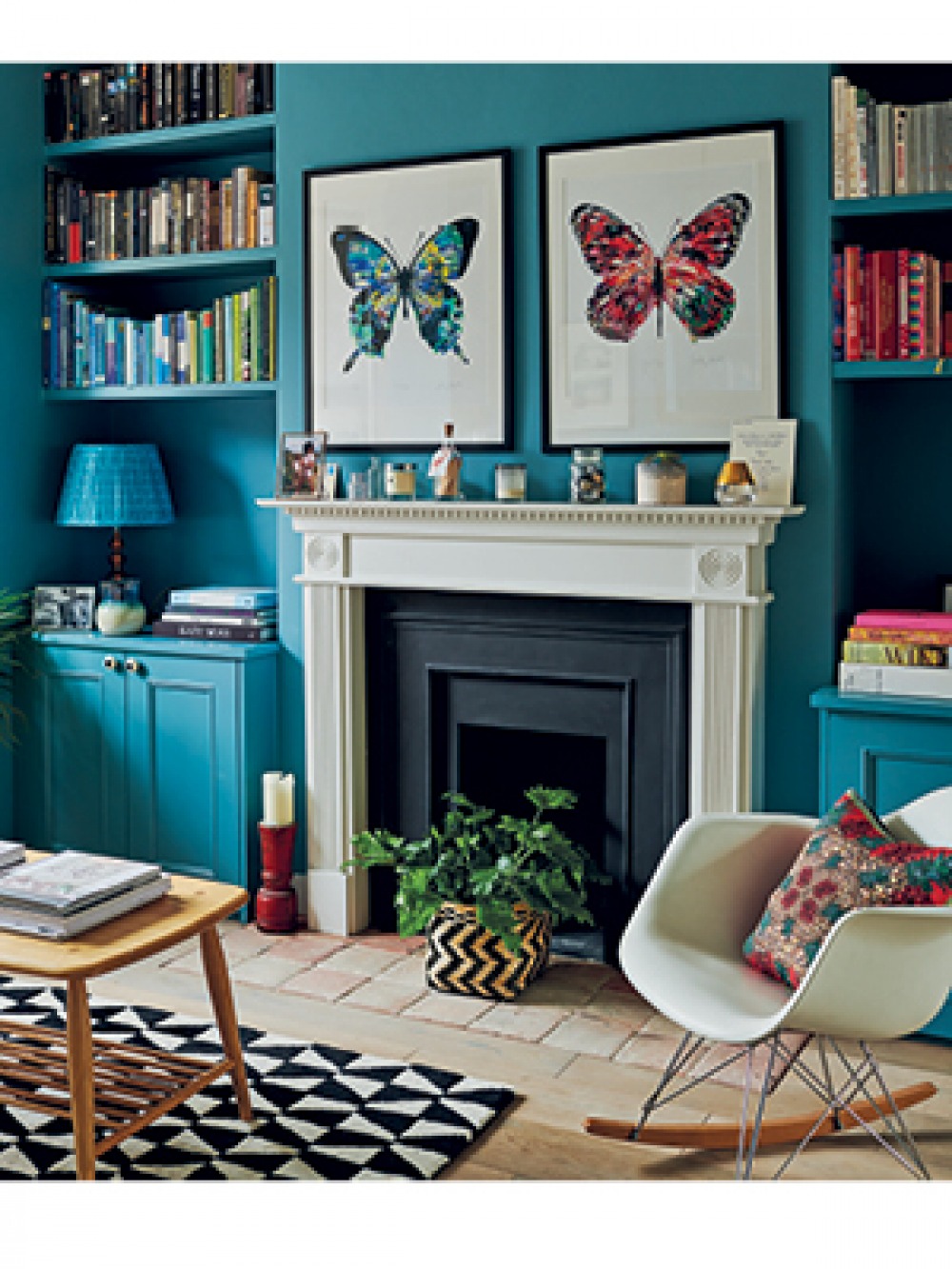 alcove book shelves either side of fireplace