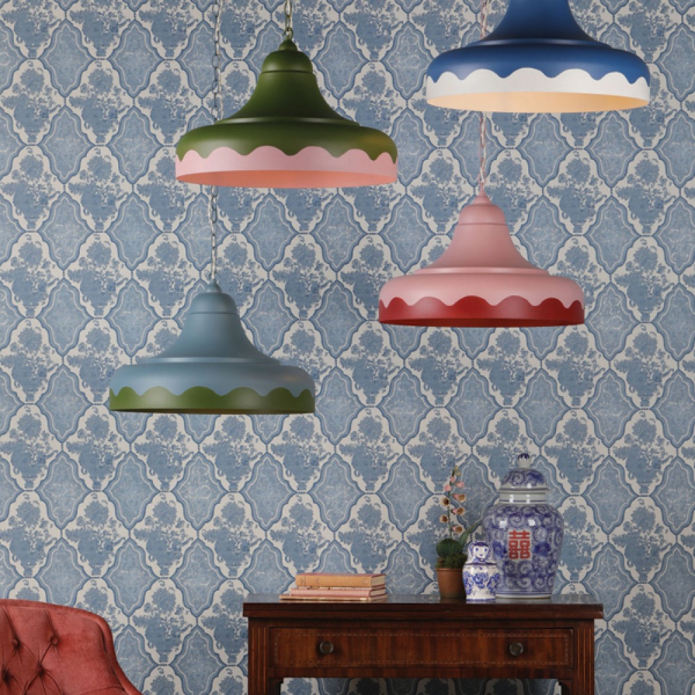 hand painted pendants hanging over chair and side table
