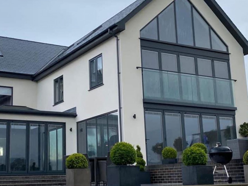 house with a glass balcony