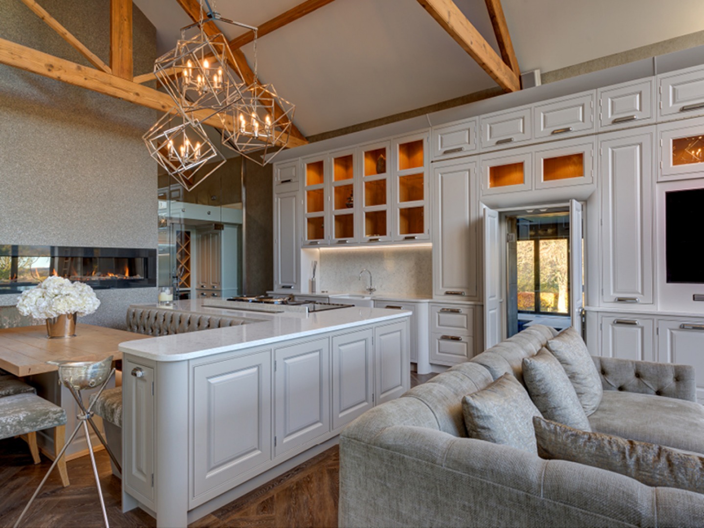 light grey kitchen and sofa space