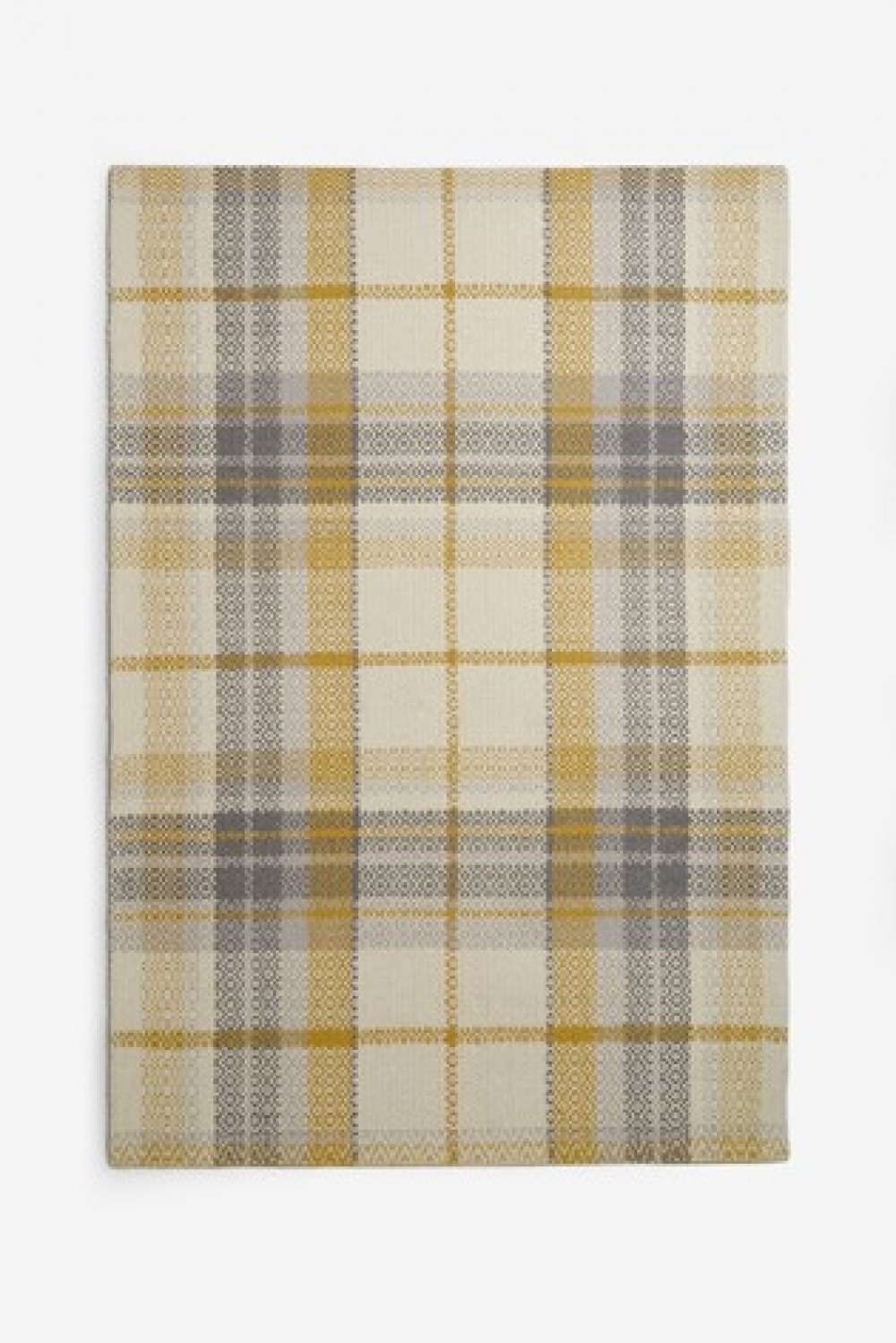 Dalton check rug, from £70 Next, branches regionwide