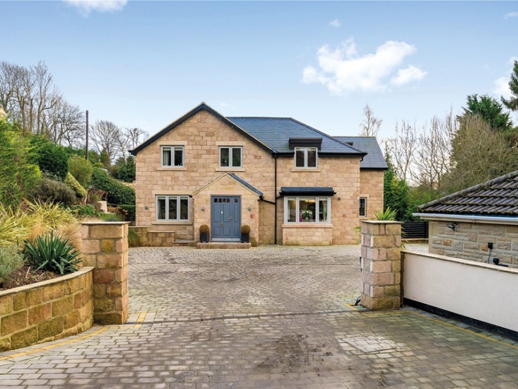 stone brick detached house with private driveway
