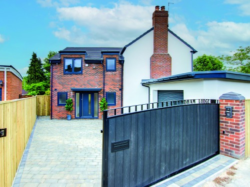 Peek Inside this Modern Family Home with a Balcony and Landscaped Gardens