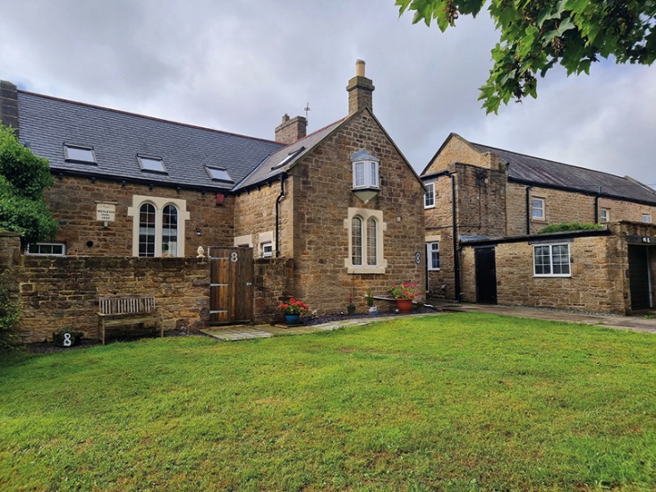 outside shot of a house and garden