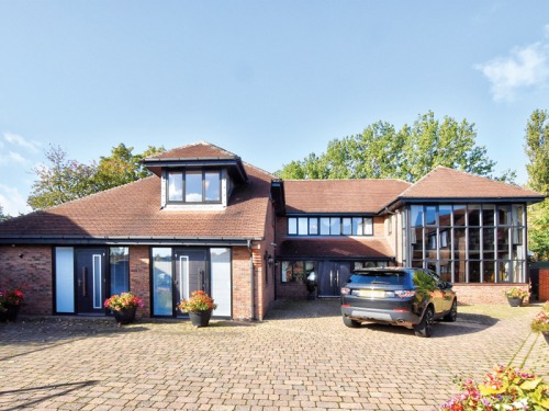 Take a Sneak Peek Inside This Magnificent Family Home Complete with Home Office, Conservatory and Large Private Garden