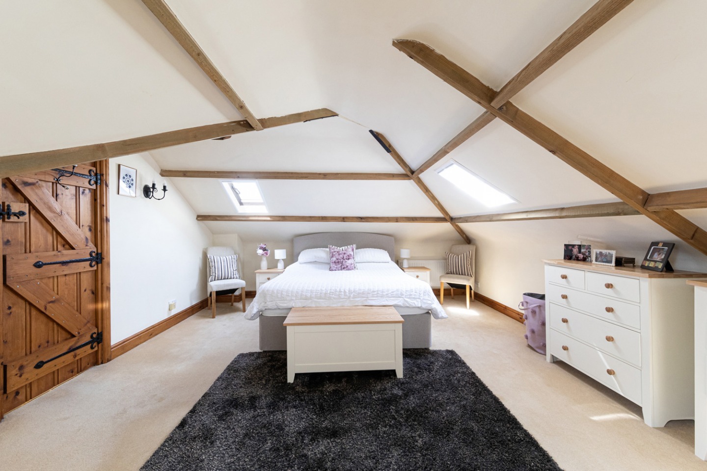Double bedroom with exposed beams