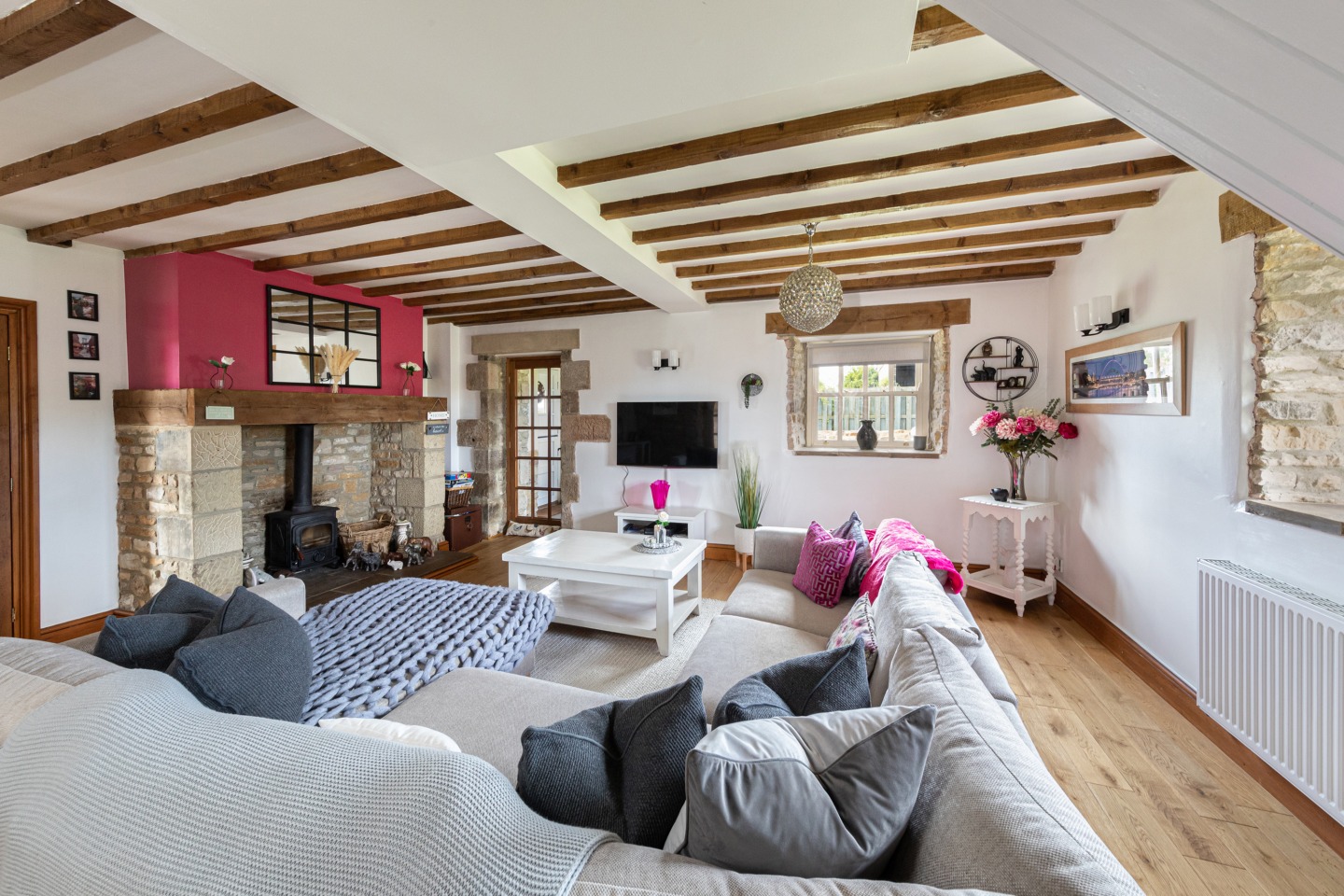 Large lounge with woodturner and exposed beans
