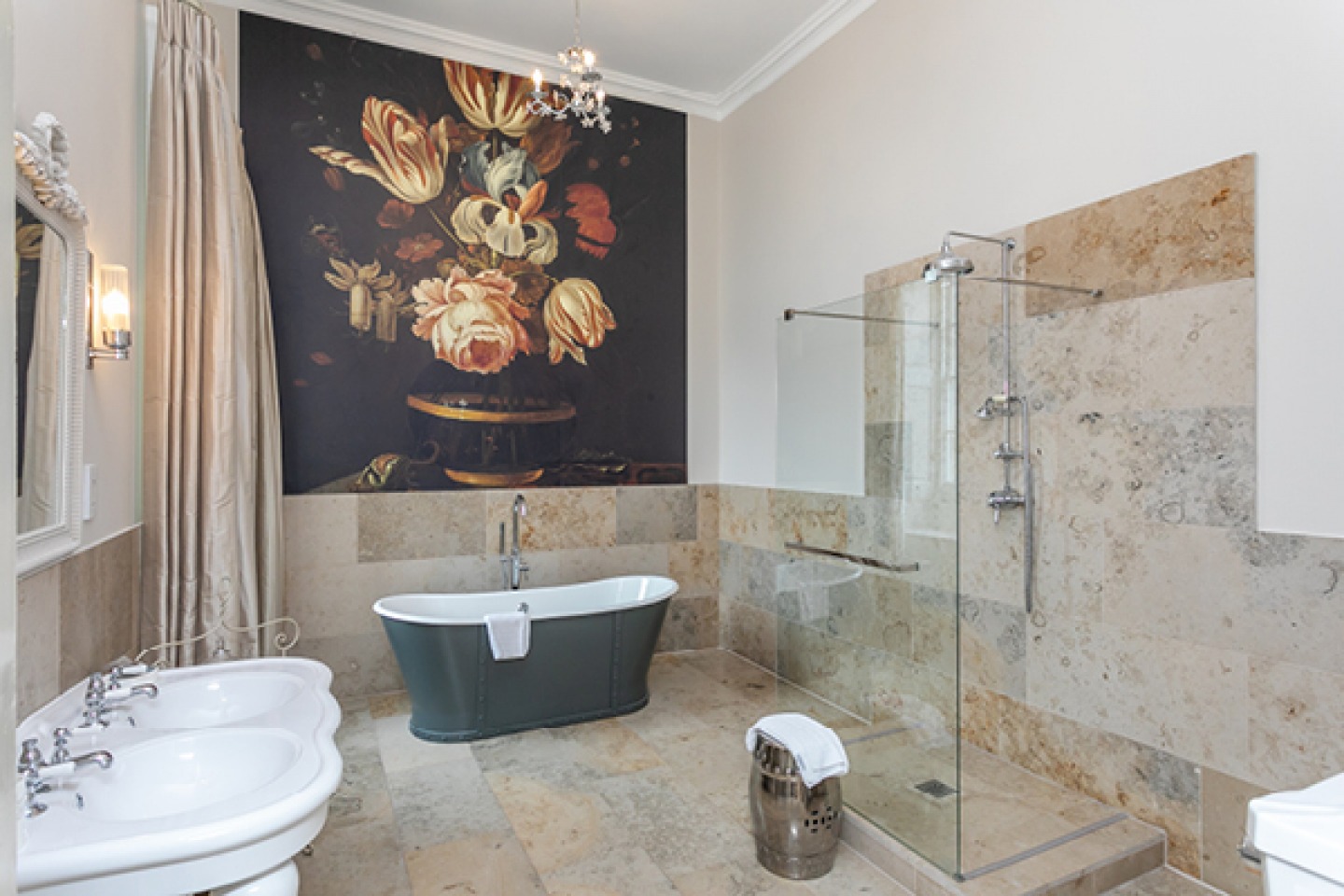 Large bathroom with free standing bath, walk in shower and his and her sinks