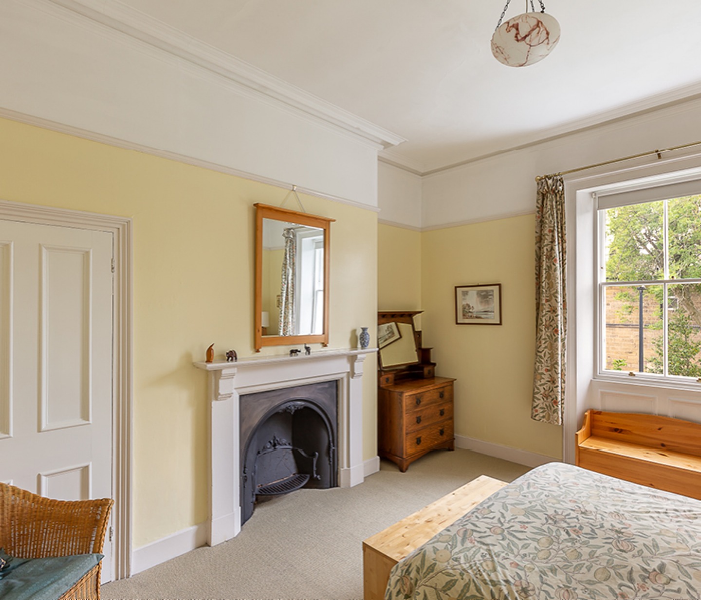 bedroom with feature fireplace