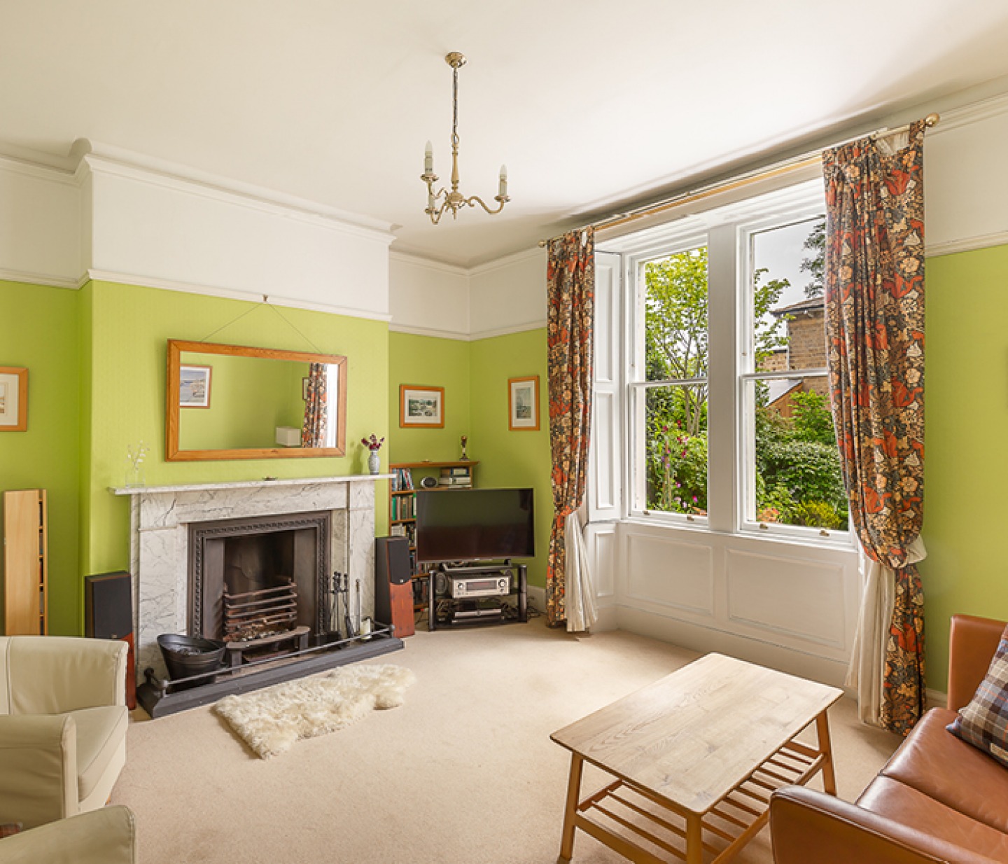 Lounge with bright walls and feature fireplace