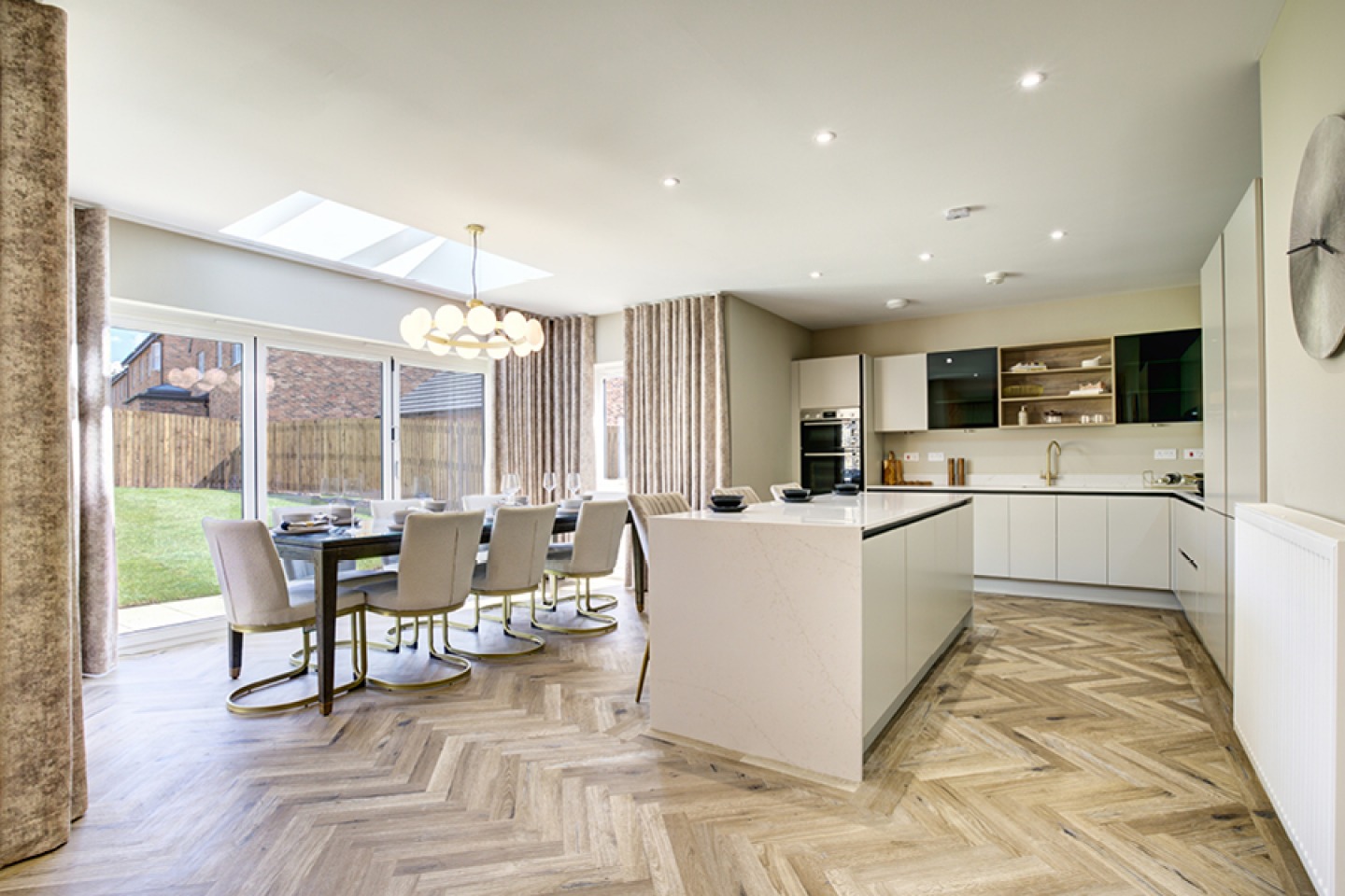 Stylish open plan kitchen dinner with bi-folding doors