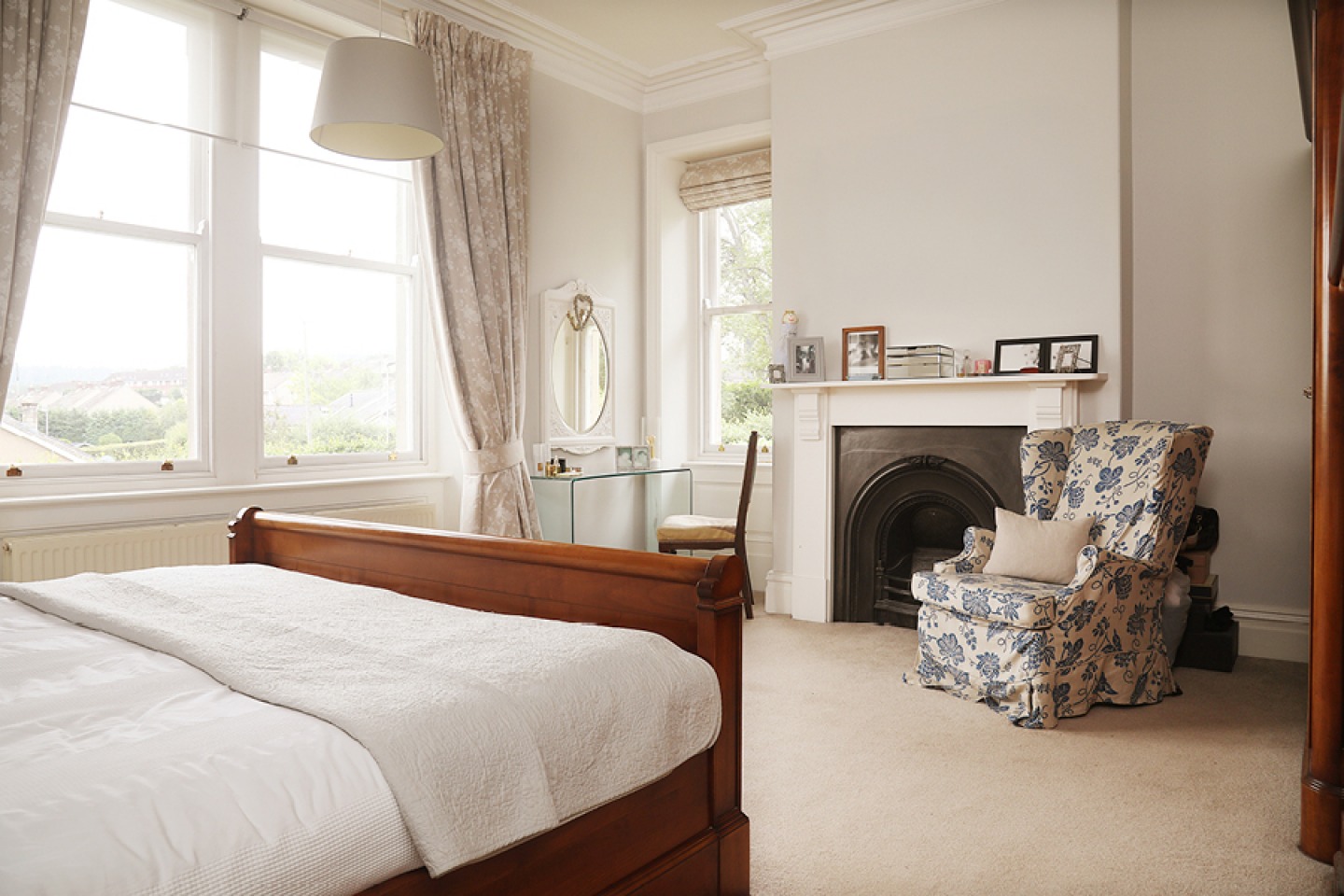Neutral decor, double bedroom with period features