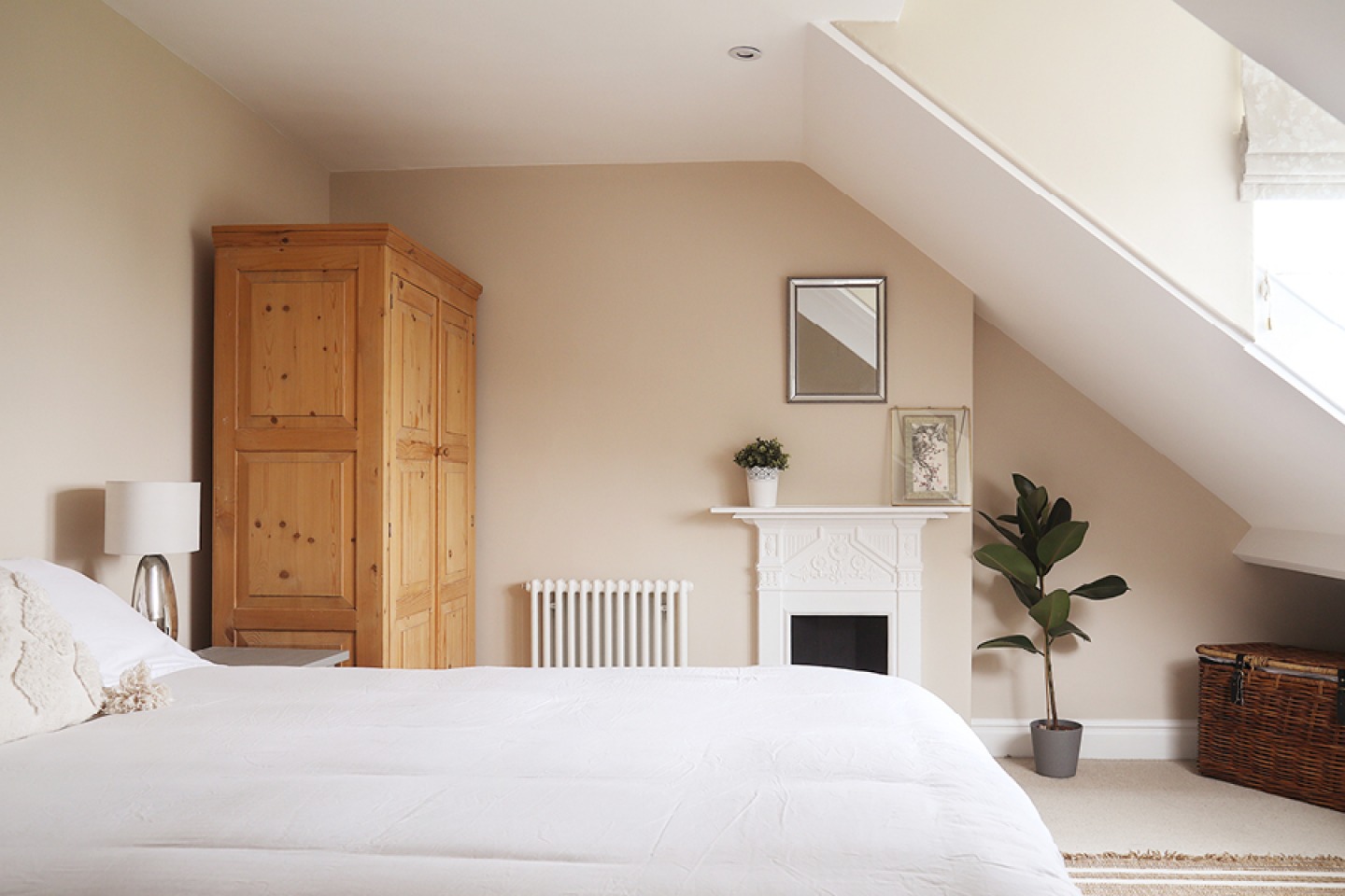 Double bedroom with period features and neutral decor
