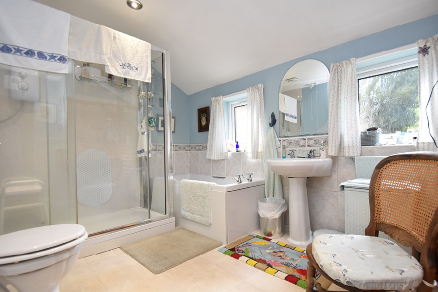 Main bathroom with shower and bath