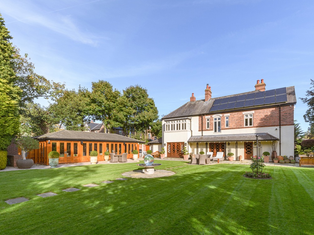 Family home, summer house and manicured lawns