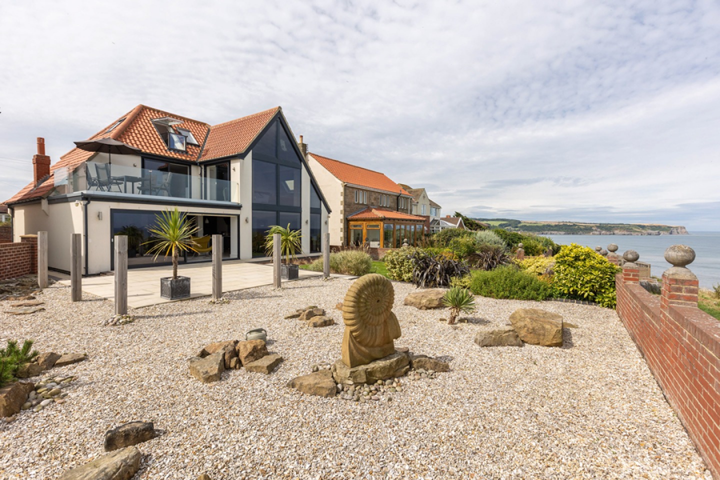 Modern coastal home with panoramic sea views