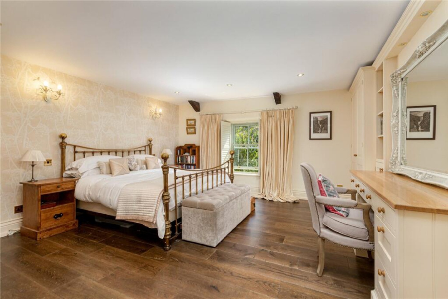 Traditional bedroom with wooden floor