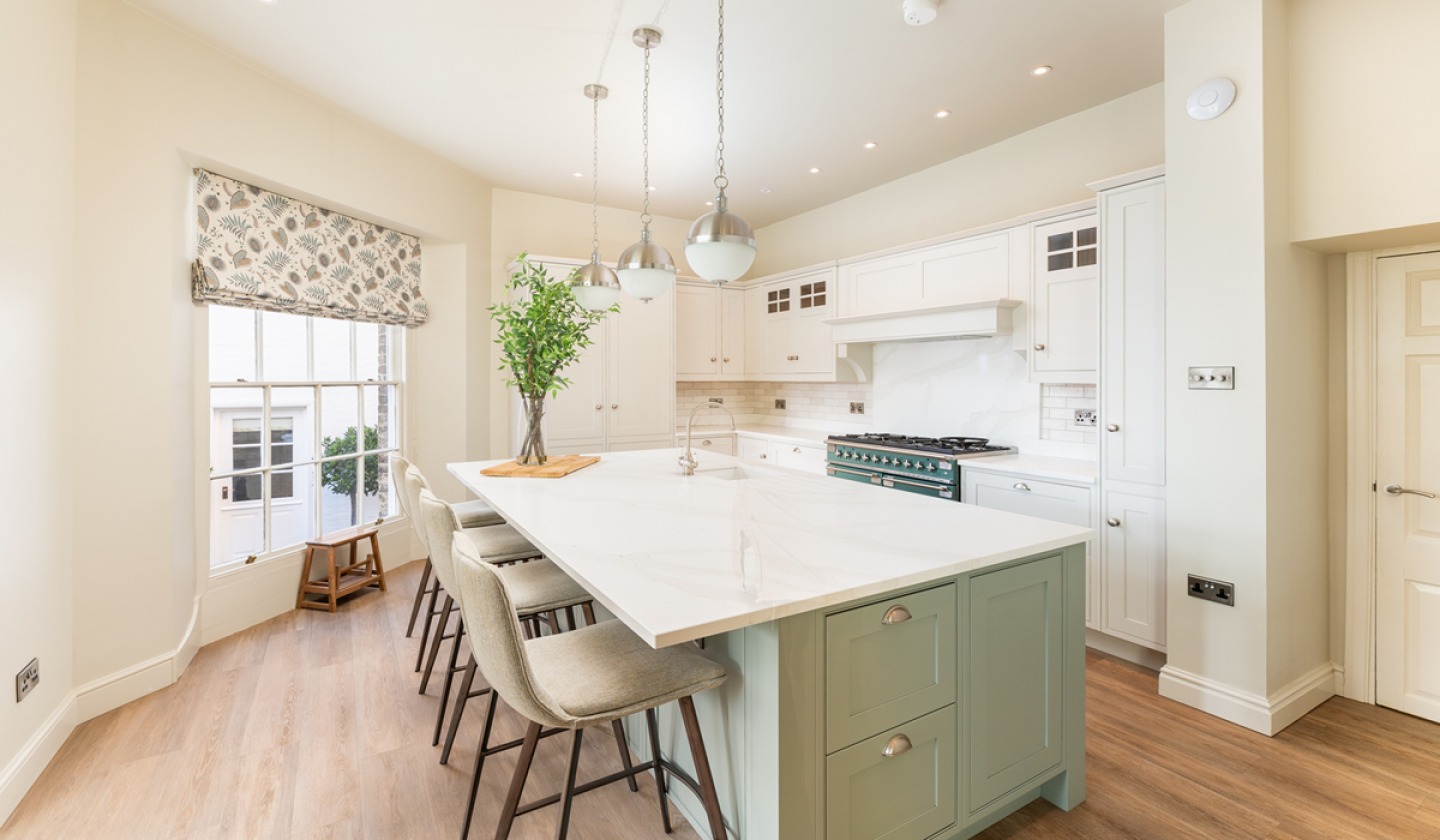 light and modern shaker style kitchen with island
