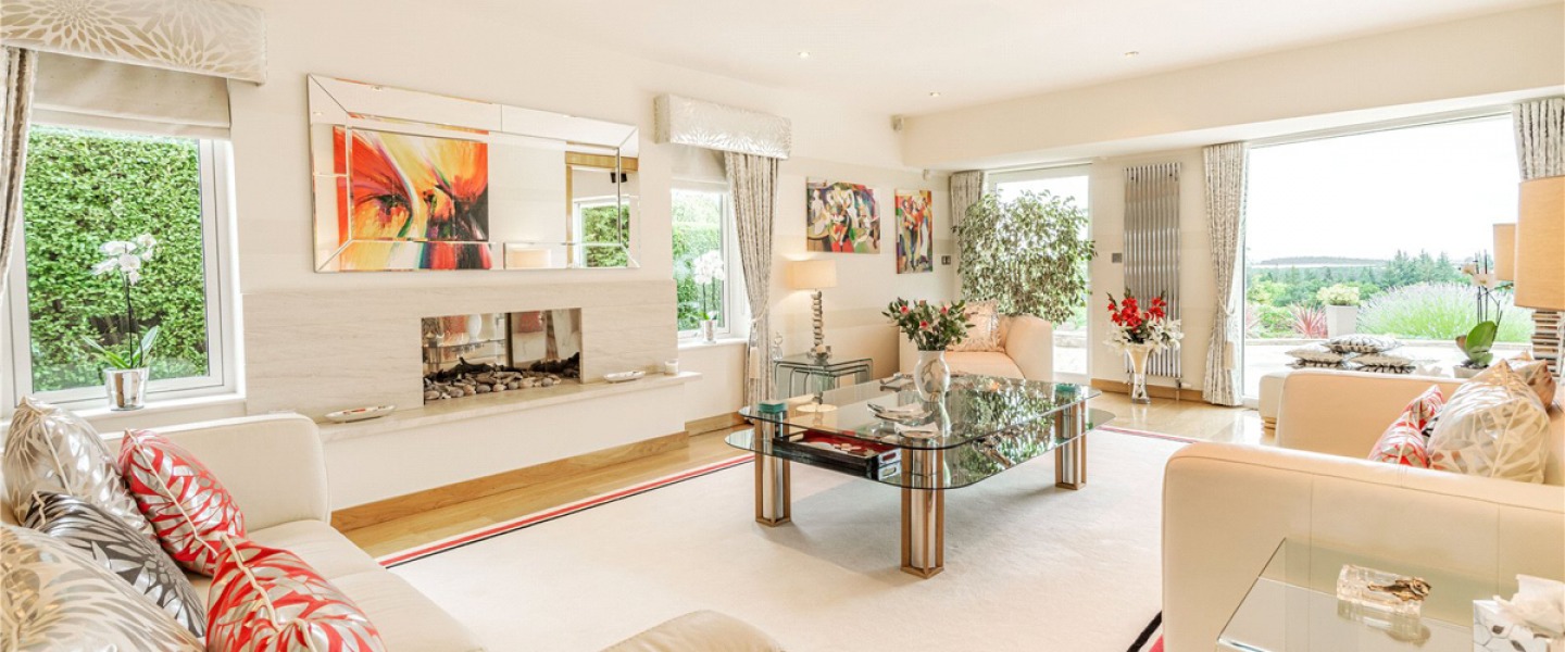 light and airy Living room with modern fire and large windows