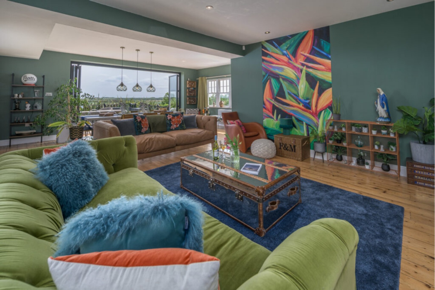 colourful lounge area with large abstract print on the wall