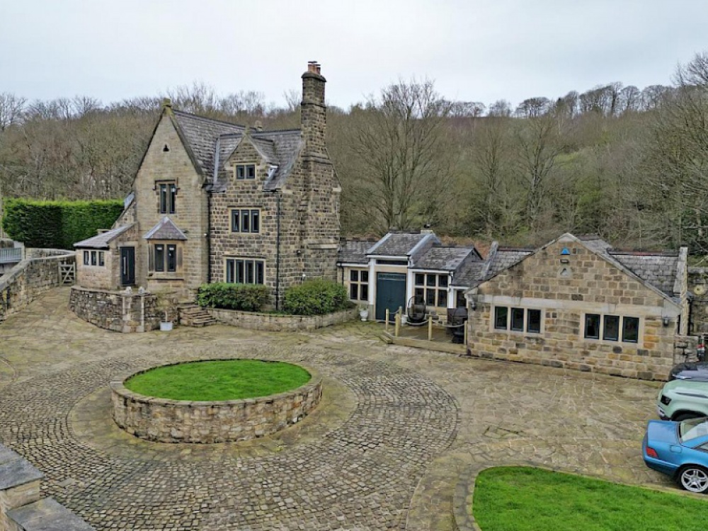 See Inside this Grand Home in a Striking Waterside Location