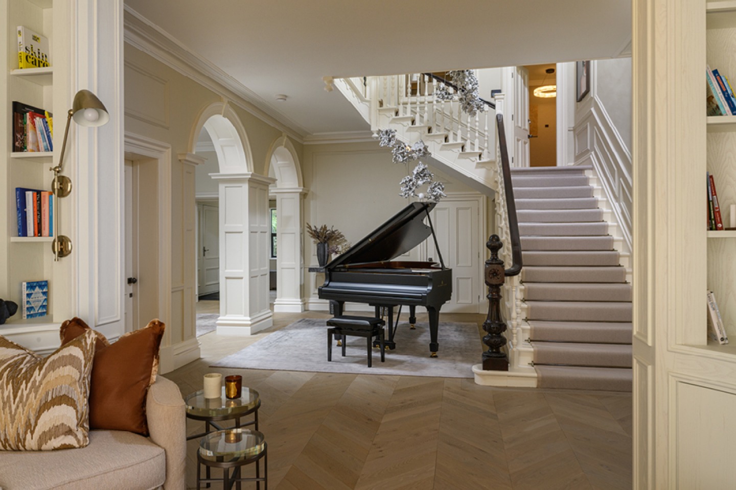 Entrance hall opens into a grand reception hall with period detailing