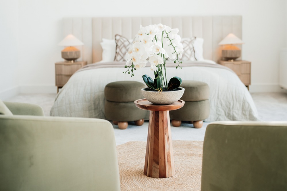 modern master bedroom with calm, neutral aesthetics