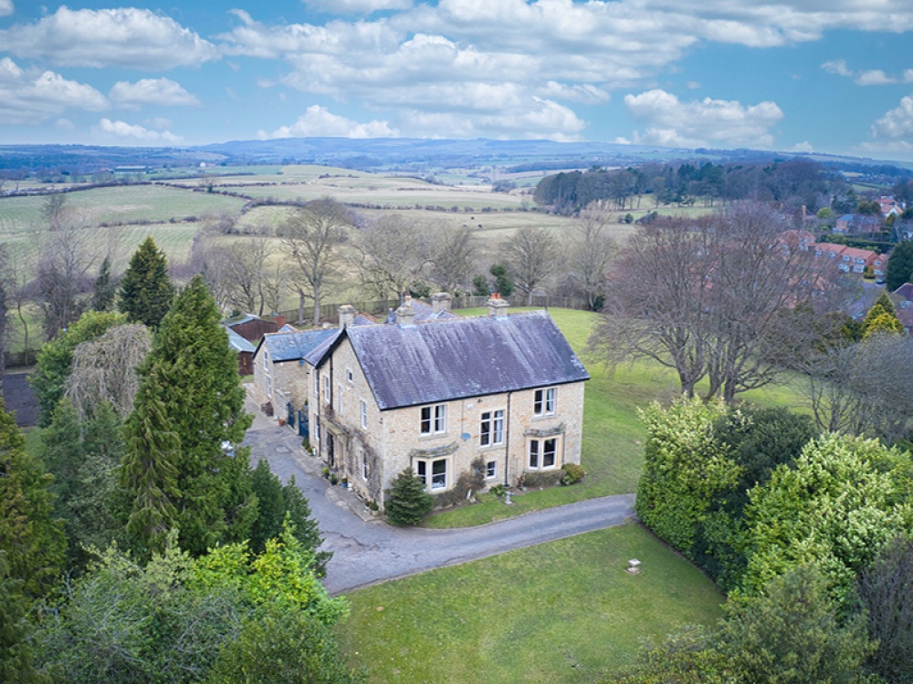 house on the hill in the countryside