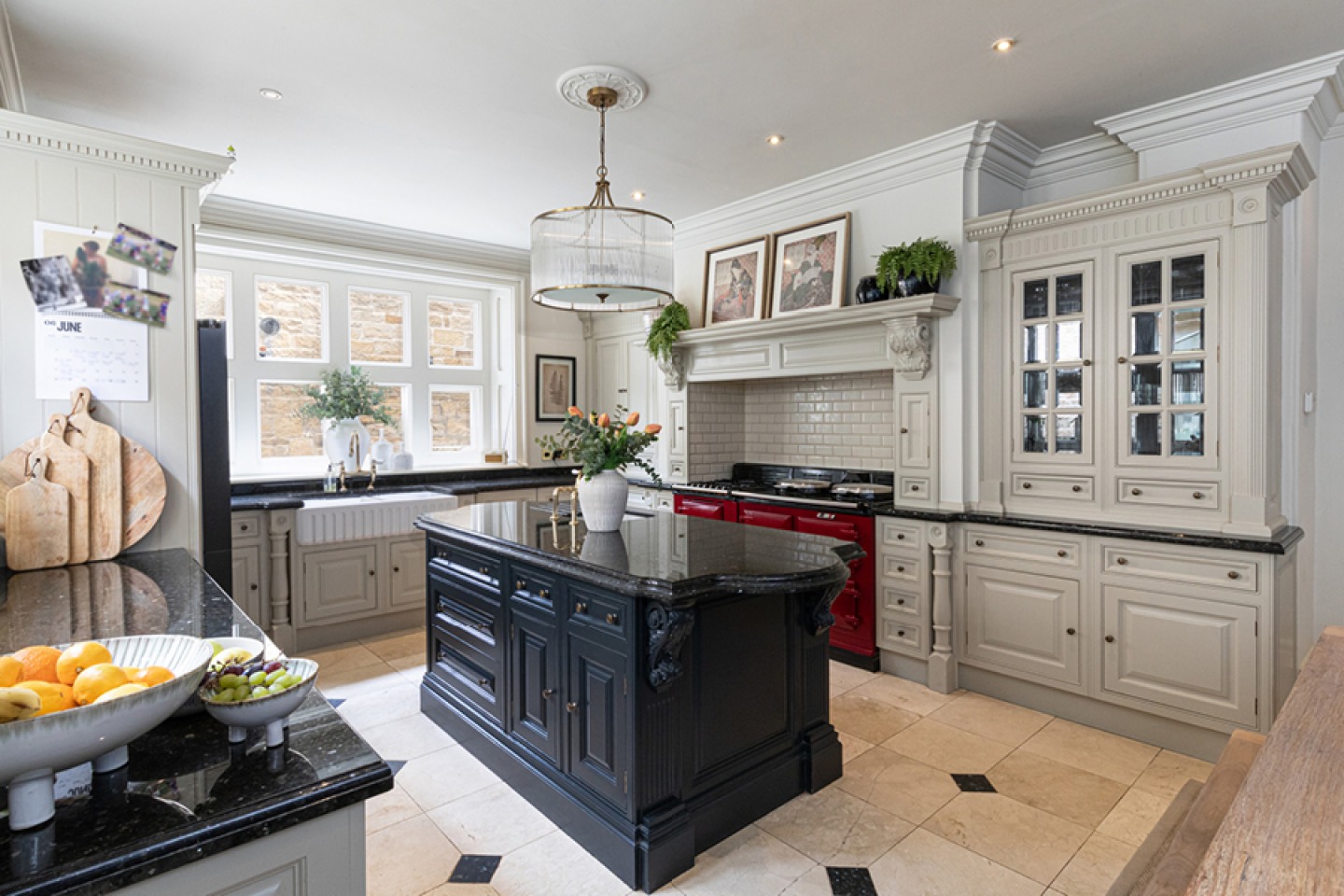 country style kitchen with range cooker and island