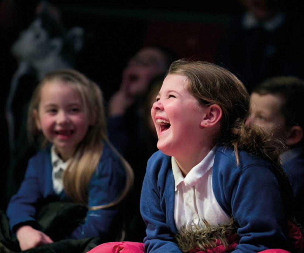 little girl laughing and smiling