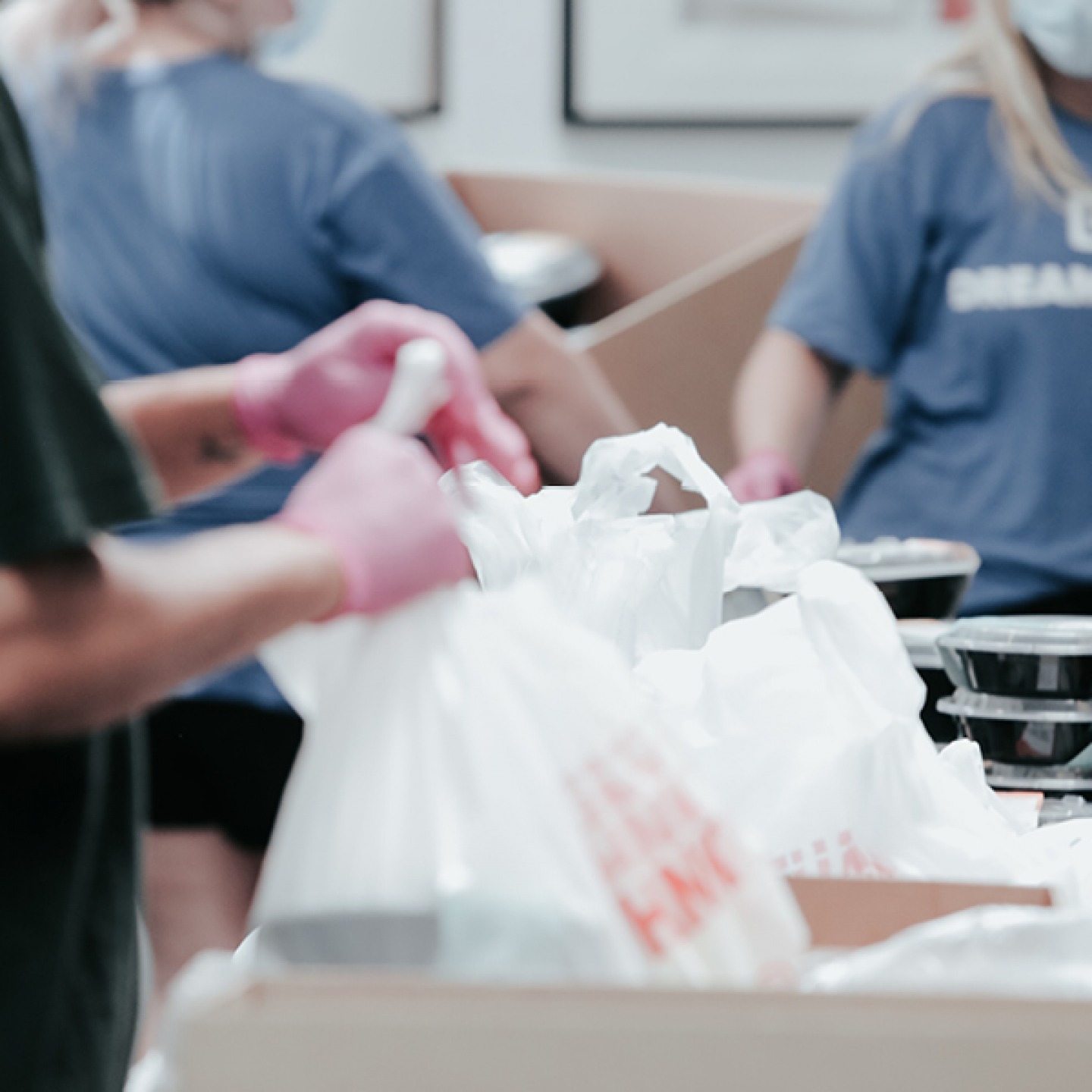 volunteers packing bags