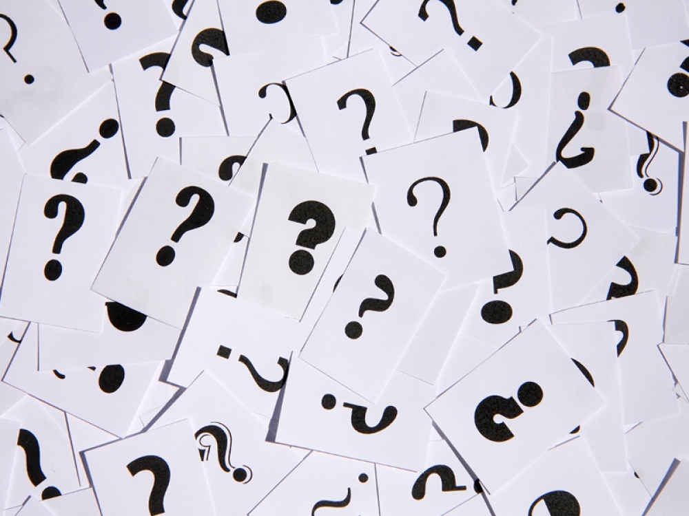 question mark on a4 paper