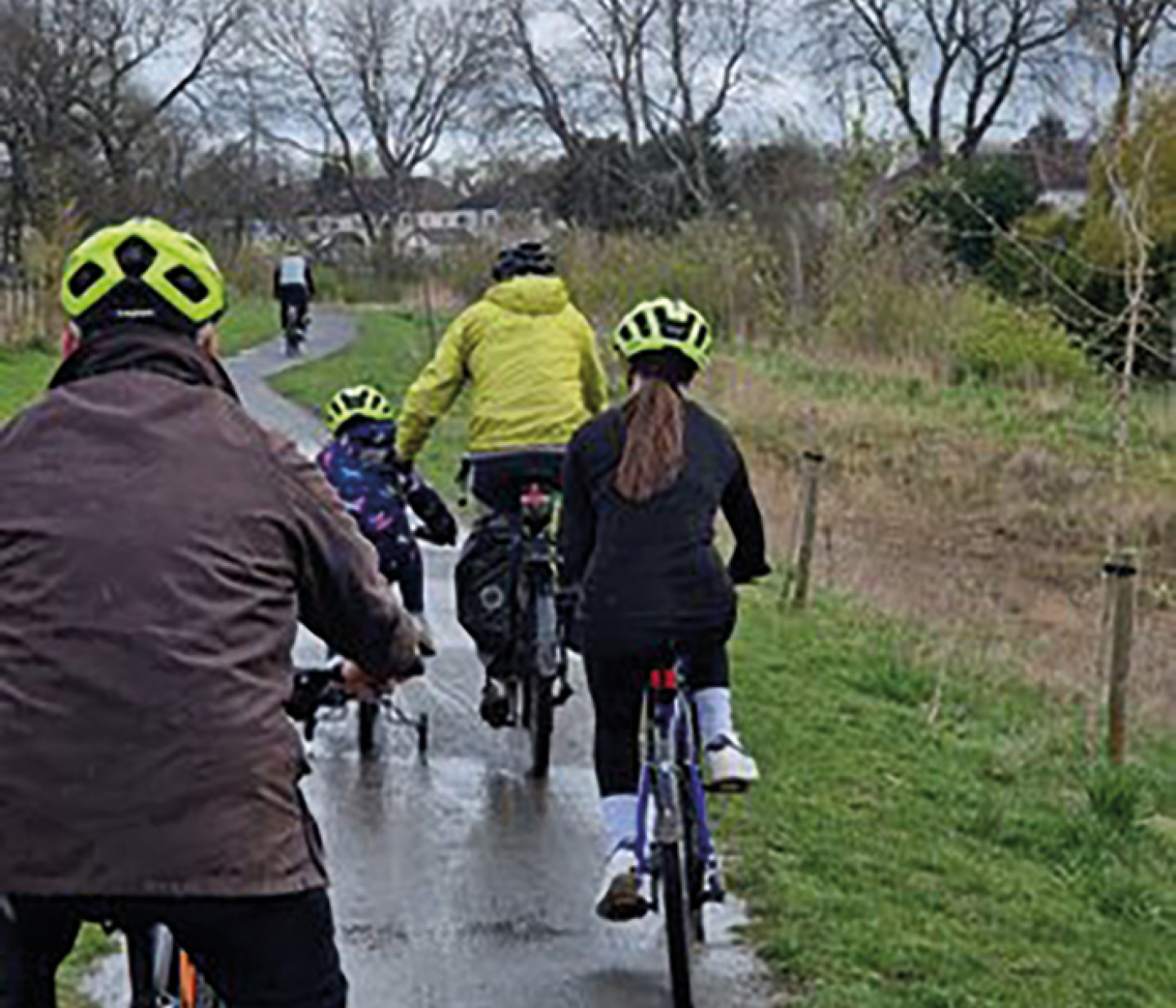 family riding bikes