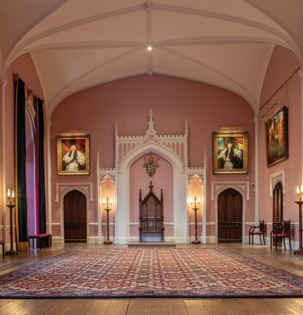 Georgian Gothic throne room with original wooden floors, pink walls and period features