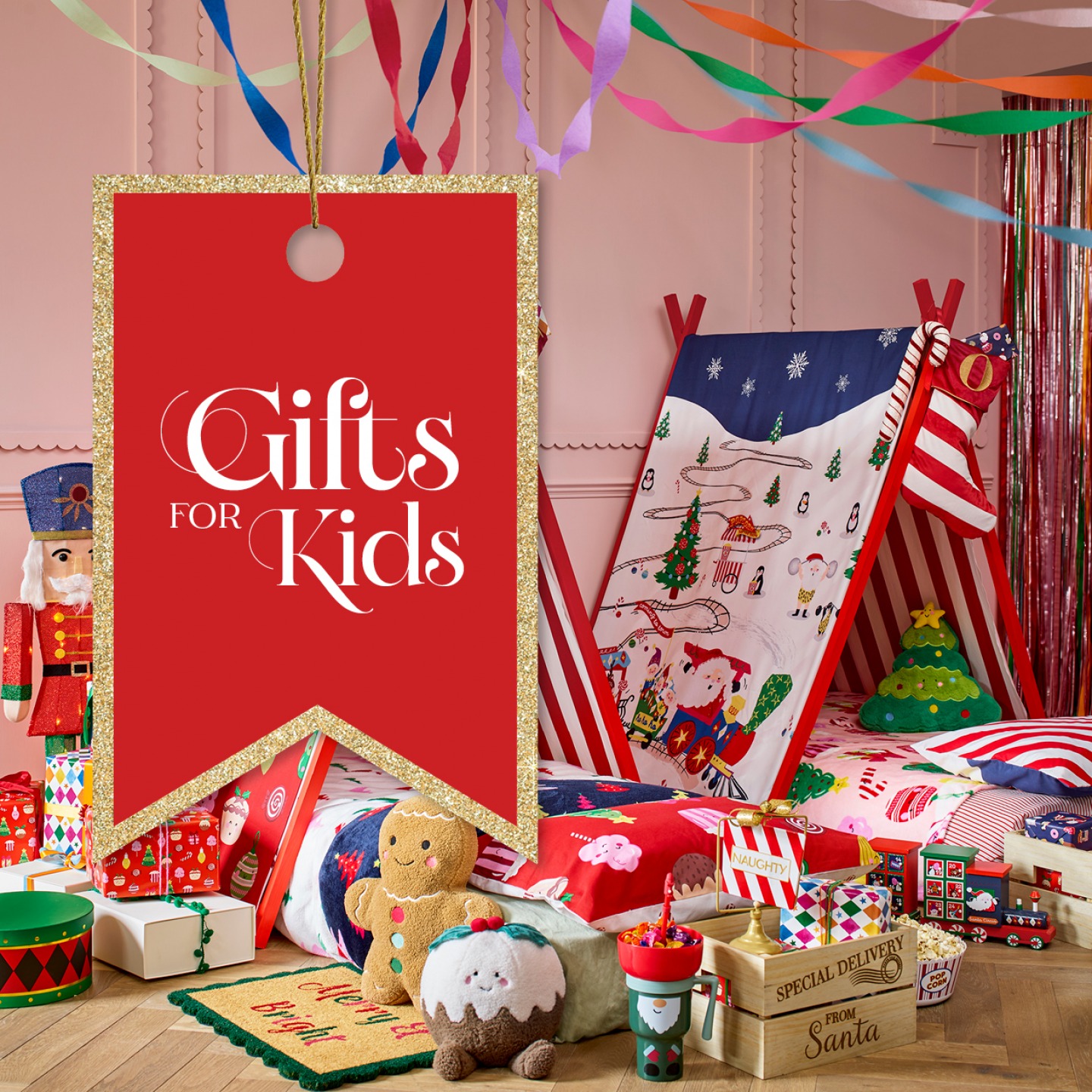 kids bedroom with 2 tent beds and lots of Christmas themed goodies