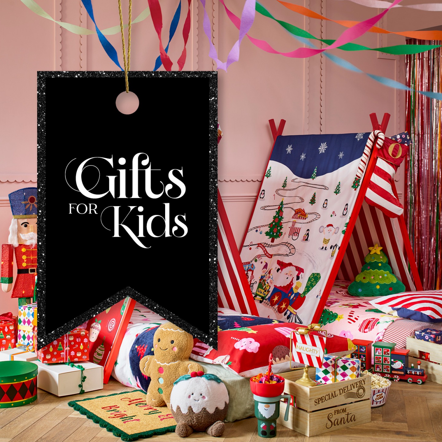 kids bedroom with 2 tent beds and lots of Christmas themed goodies