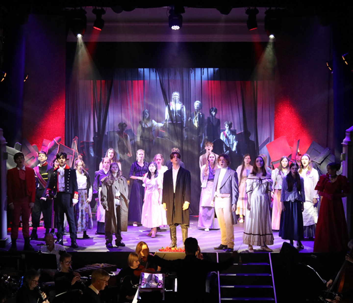 students acting on stage