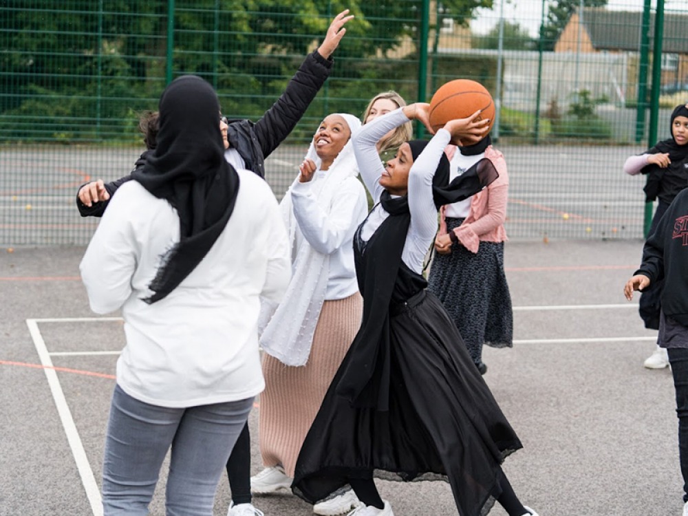 group of girls playing basketball