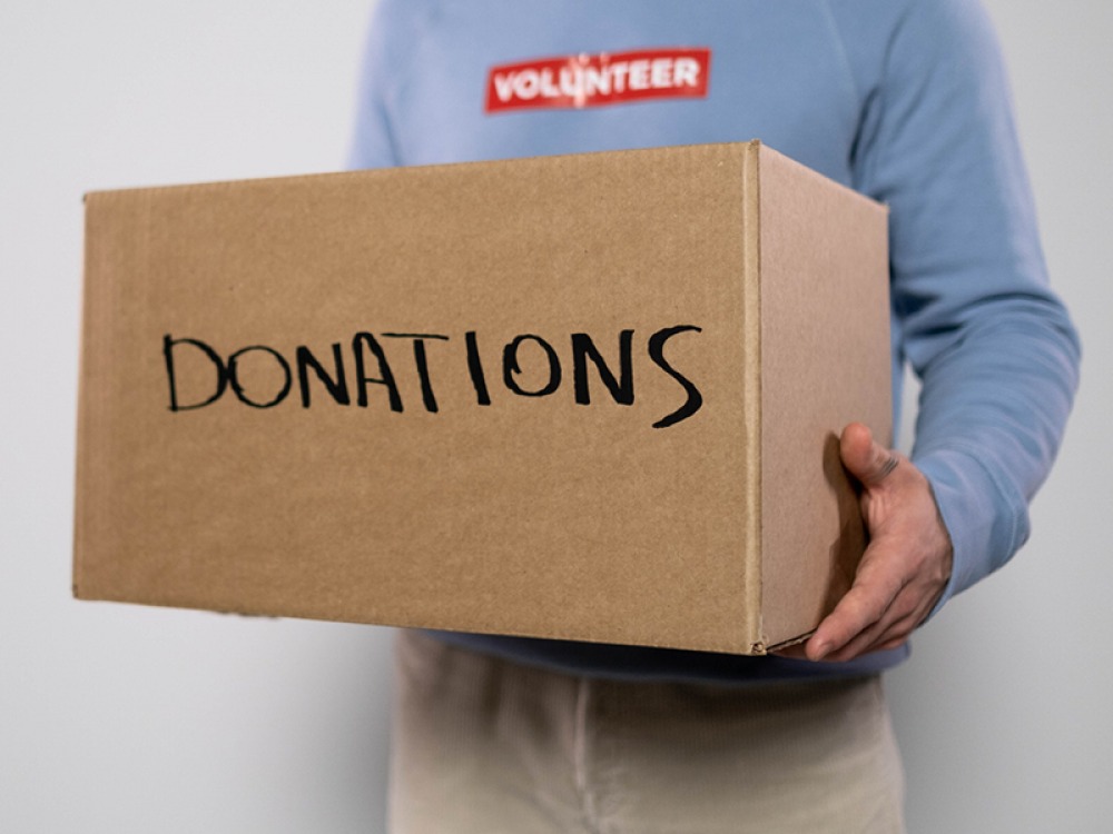 brown box with donation on the front