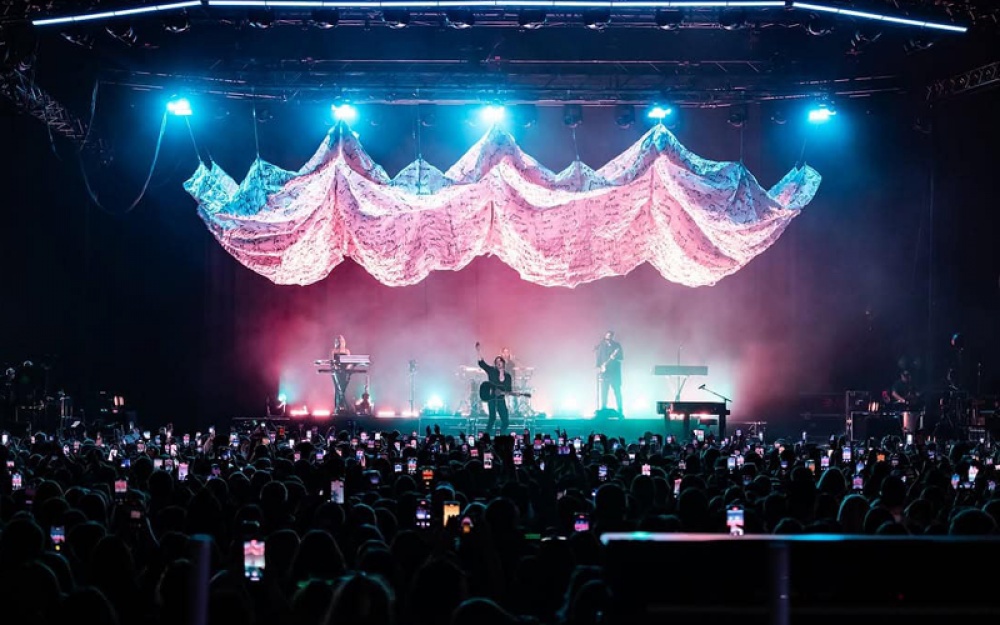 singing on stage performing to a crowd