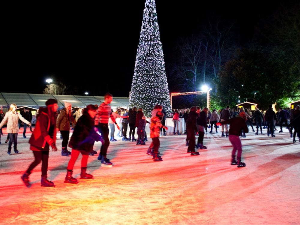 ice skating around christmas tree