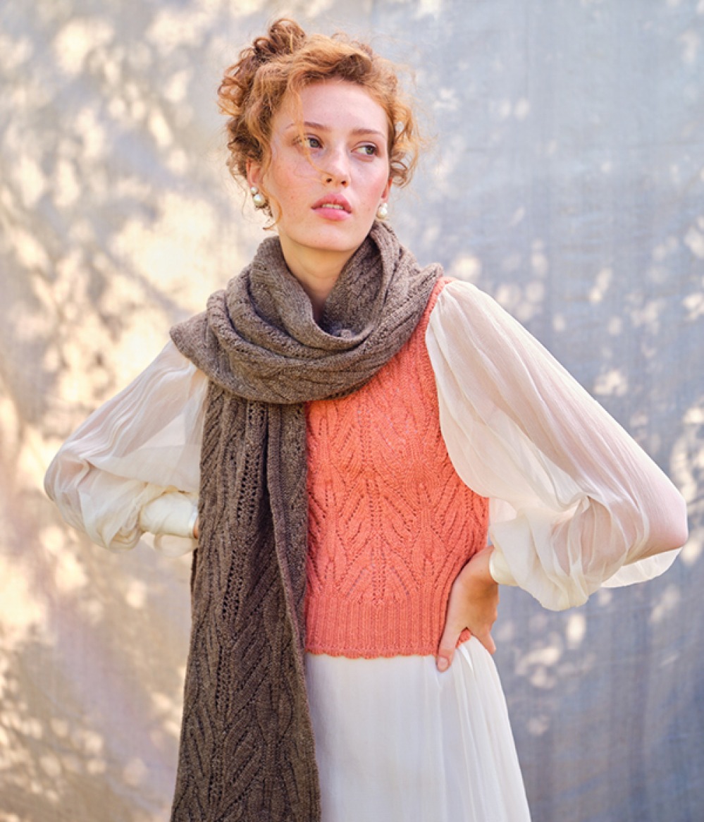 woman wearing long chunky knitted scarf
