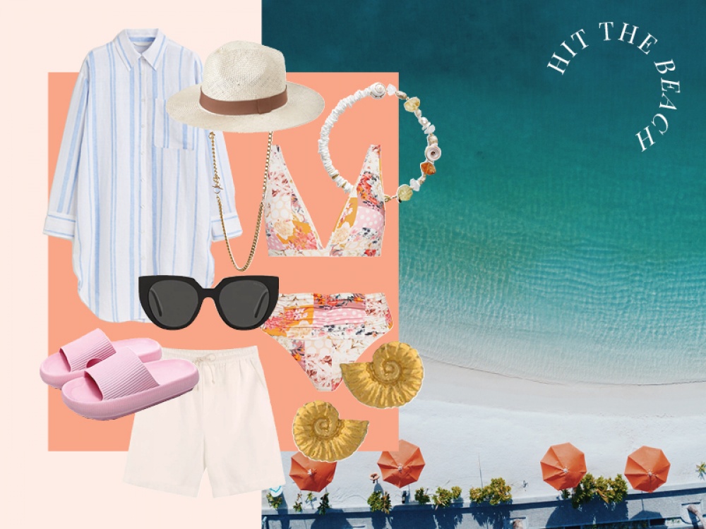 Ariel view of a beach with orange umbrellas with fashion product shots