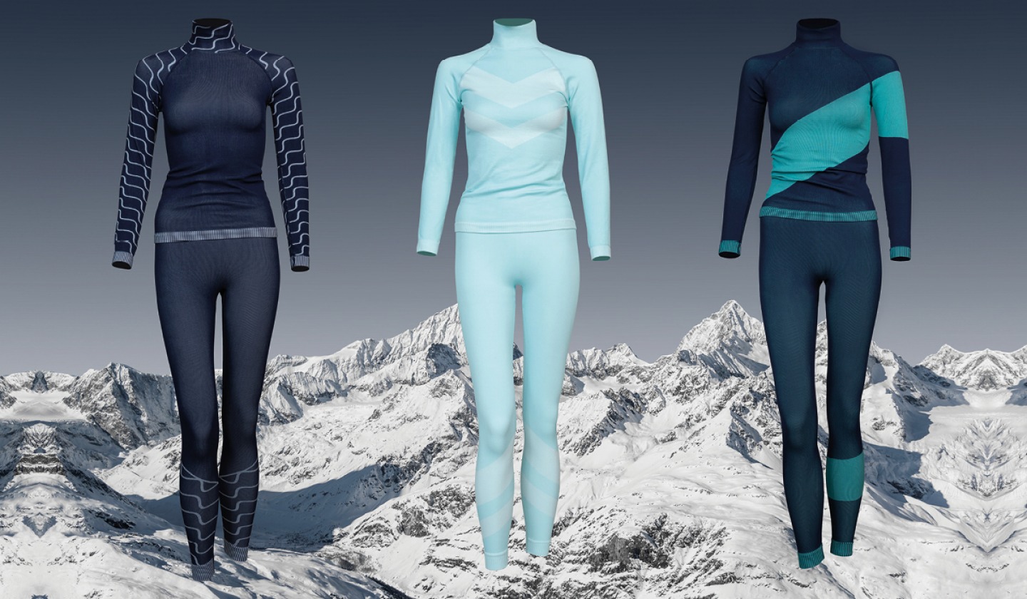 3 skiwear base layers layered over image of mountains