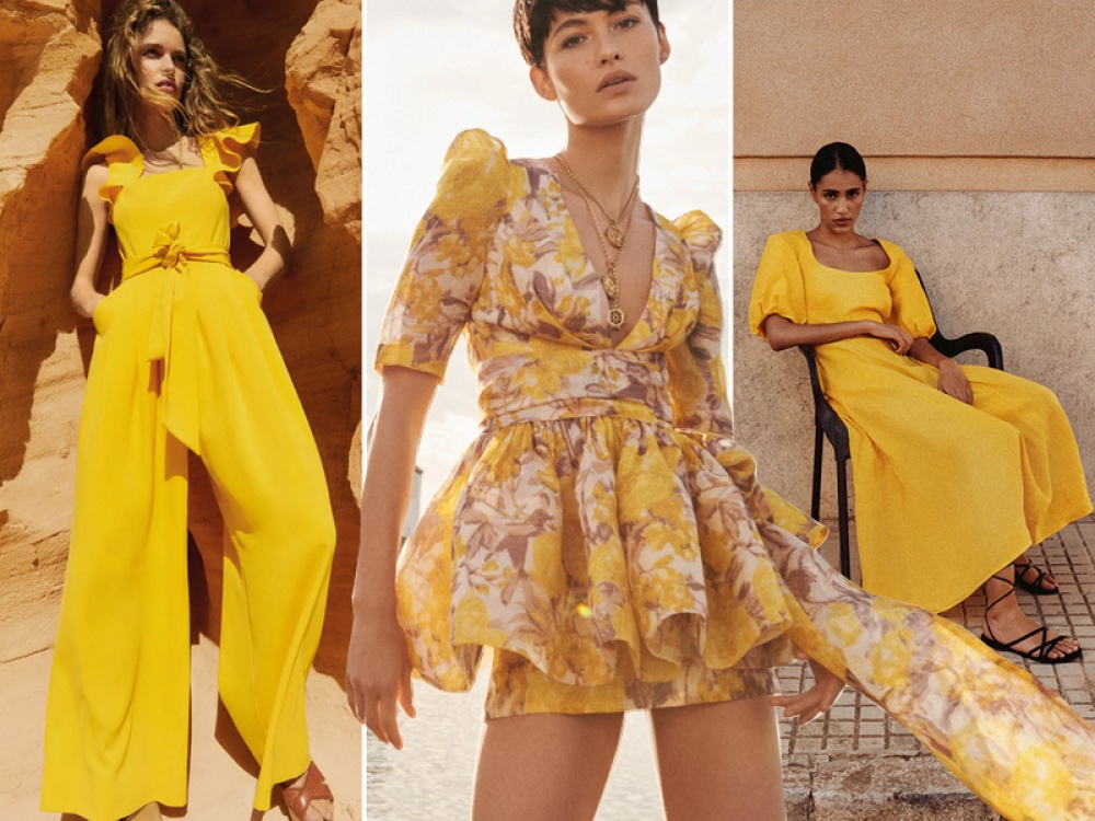 3 models wearing yellow dresses