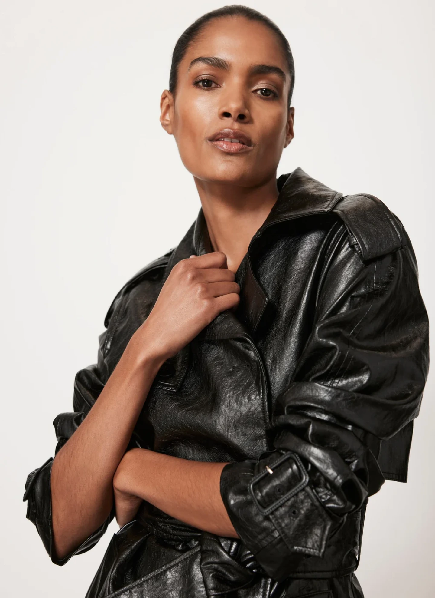 Mint Velvet Model wearing black coat