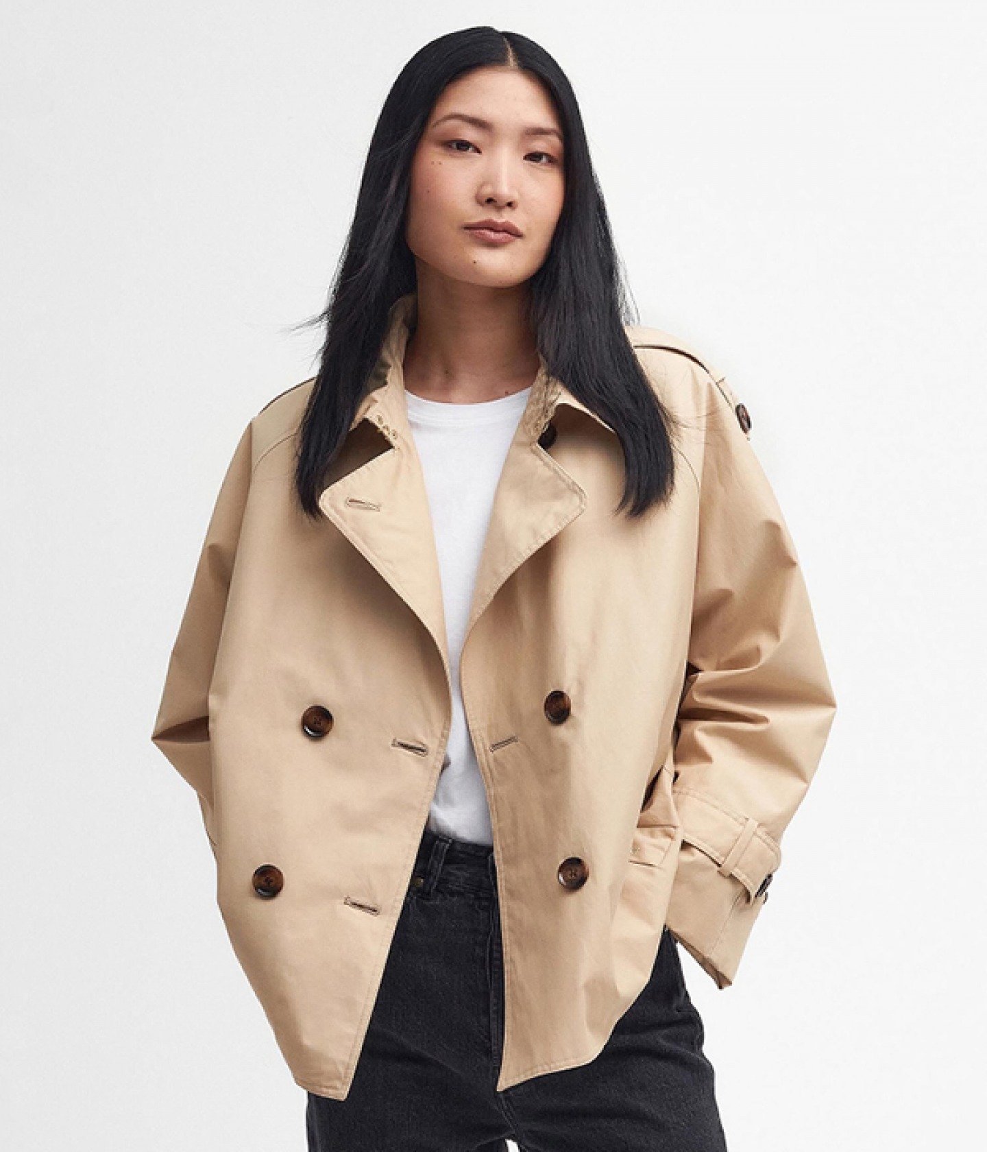 Model wearing Annie short trench